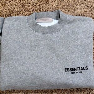Fear of God Essentials crew neck. Size small. Color dark oatmeal. Barley worn!